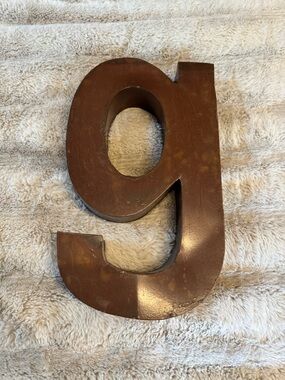 Large metal decorative Letter 'g' in brown